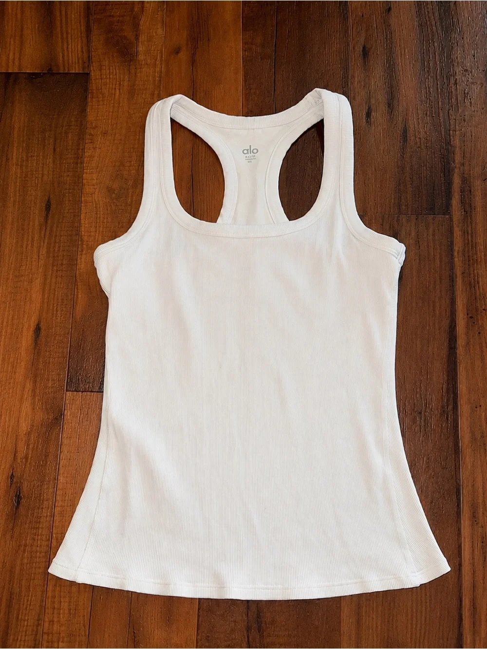 Excellent condition Pristine Alo Yoga Rib Support White Tank Medium